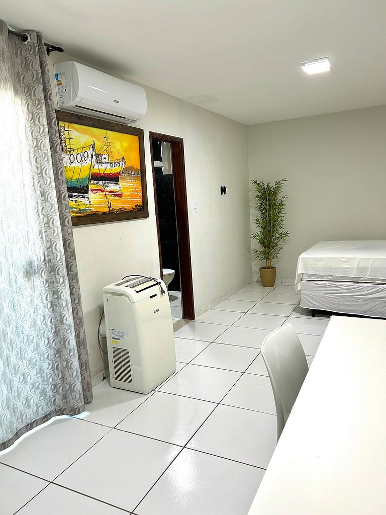 "Flat aconchegante e bem localizado.