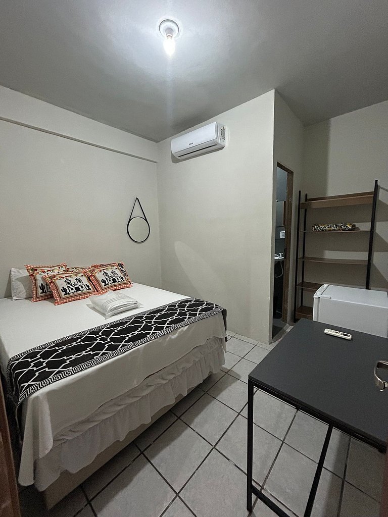 Suíte com ar condicionado e WiFi muito confortavel
