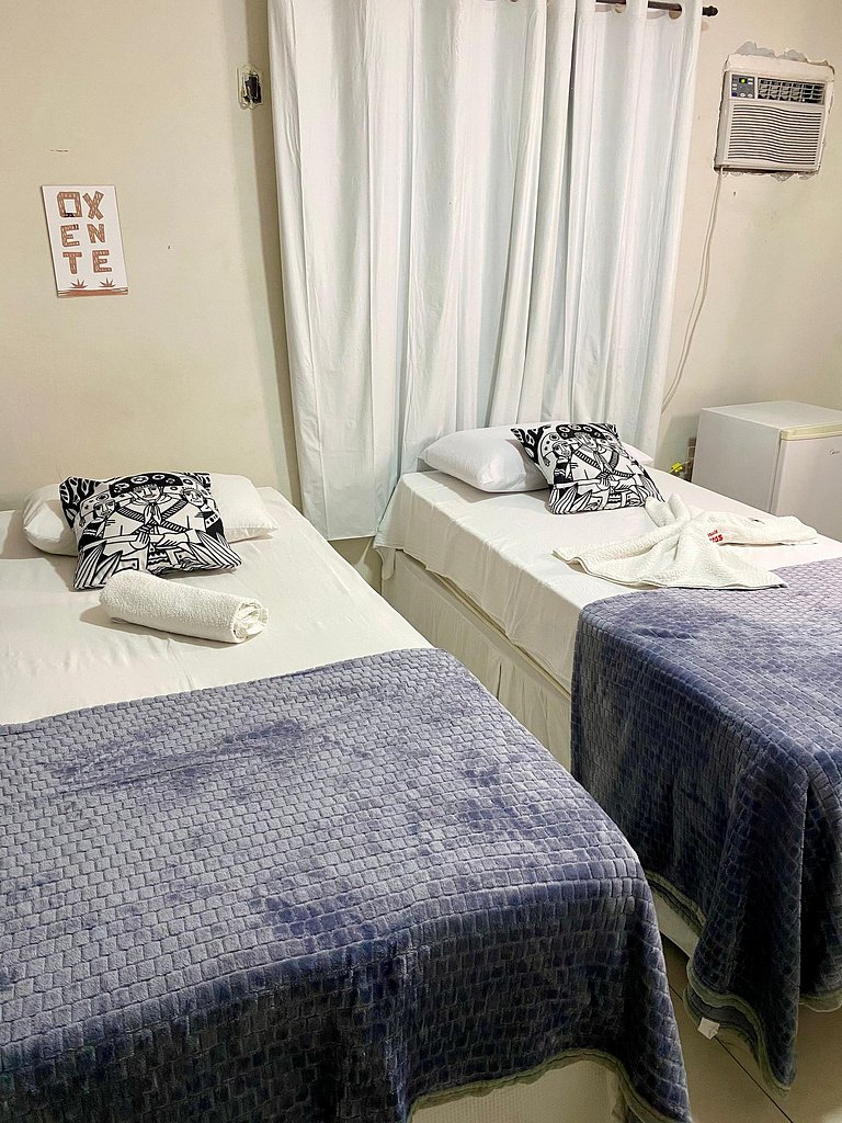 Quarto Triplo Confortável e Seguro - Pousada Mandacaru